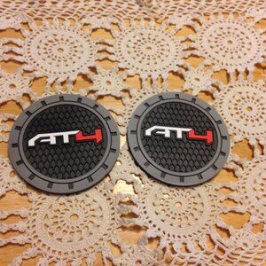 AT4 car coasters, new